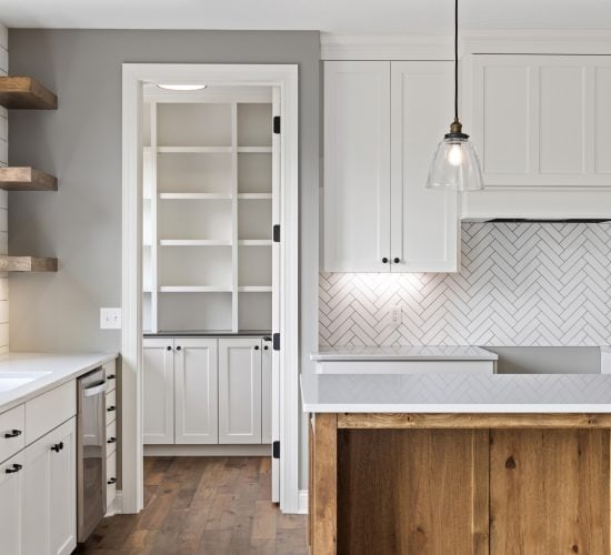 kitchen with view of walk in pantry