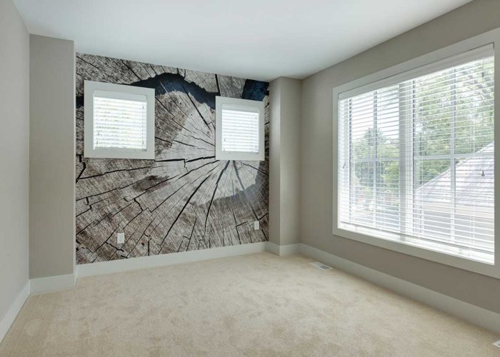 Bedroom with unique wood accent wall