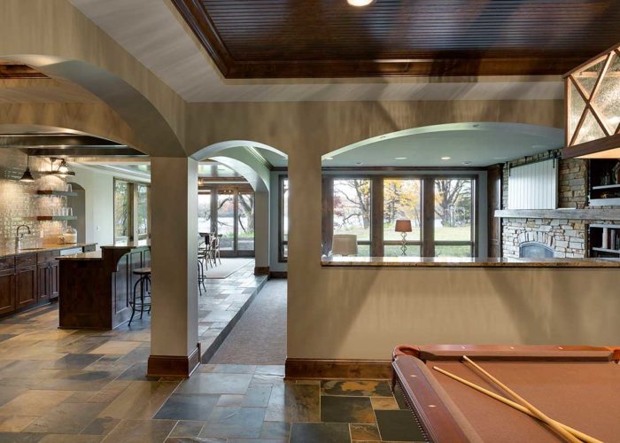 Architectural details of basement bar area with pool table