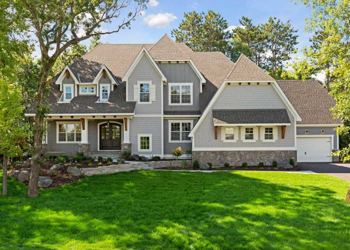 Exterior of home at 2 Tree Farm Lane in sunlight