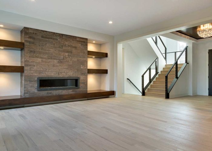 Large unfurnished great room with fire place