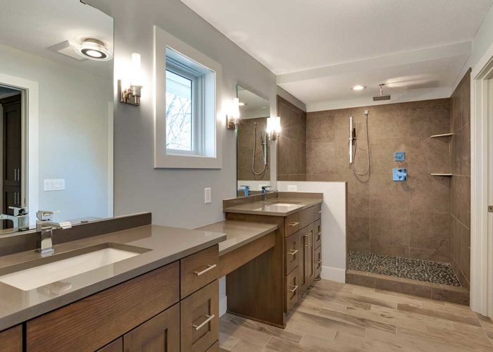 Bathroom with double vanity and walk in shower