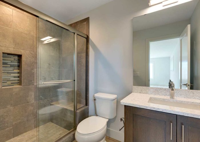 Shower with sliding glass door