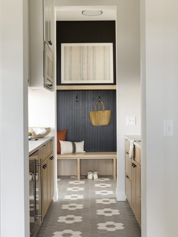 Open Entryway Mudroom With Seating Area And Custom Shelving