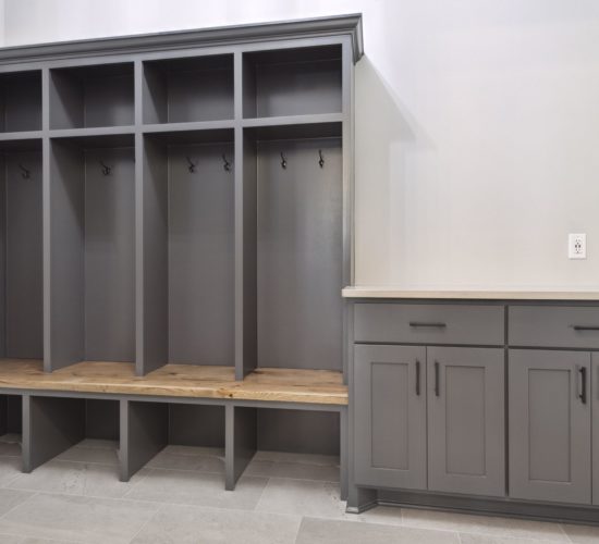 mudroom with gray built-ins